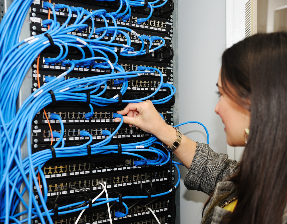 Female administrator at server room