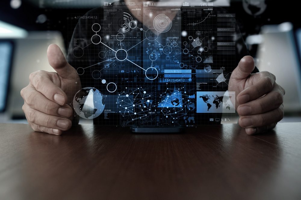 Businessman hand using mobile phone with digital layer effect as business strategy concept_RD