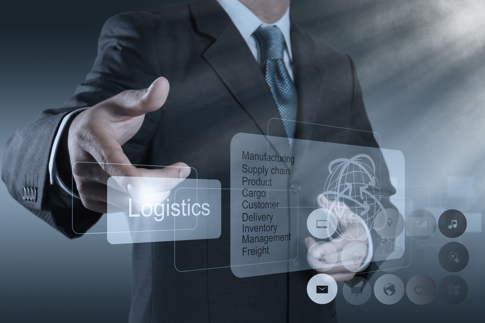 businessman hand shows logistics diagram as concept